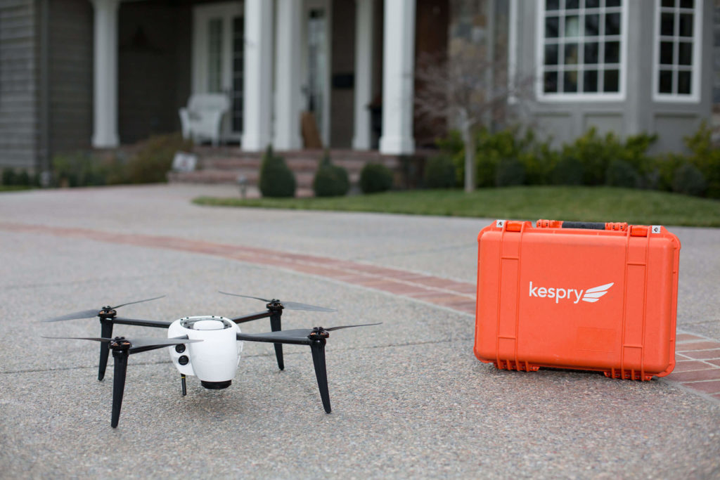 Small black and white grounded 3D printed drone